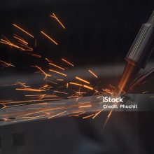 Close up scene the laser welding process by automatic system. The high technology welding process by laser welding machine.